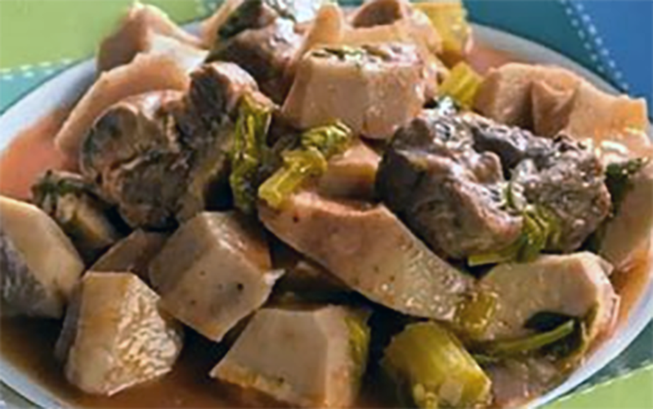 taro pieces stewed in wine with onions served on a plate
