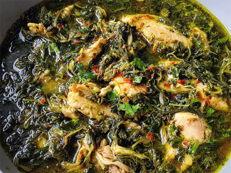 Chicken and common mallow leaf stew in a bowl