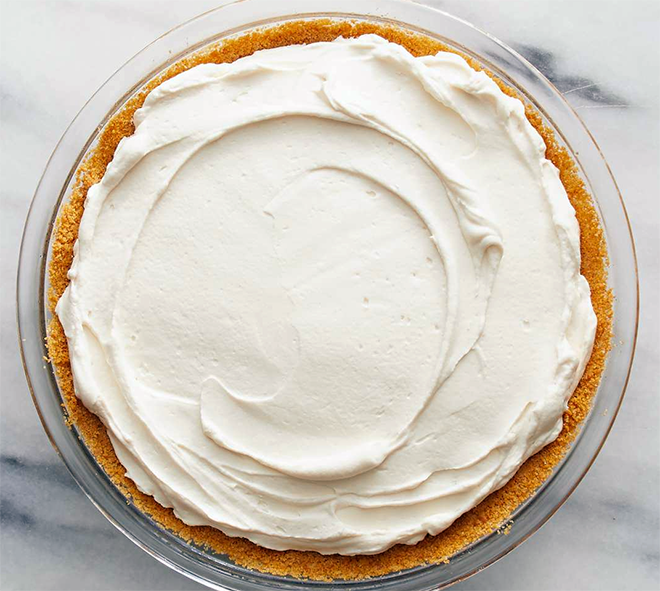 cream cheese and cool whip cheesecake prior to decorating