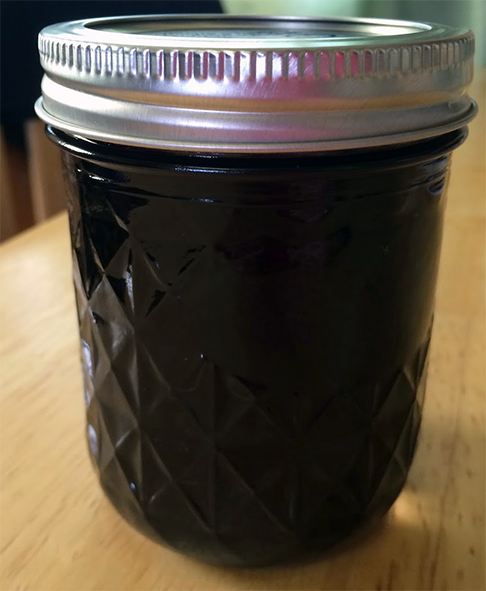 crowberry jelly in a sealed jam jar