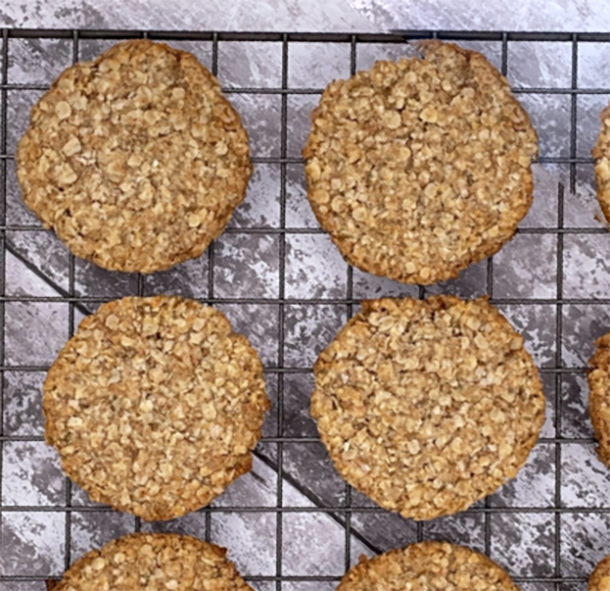 crunchy oat biscuits cooling on a wire rack
