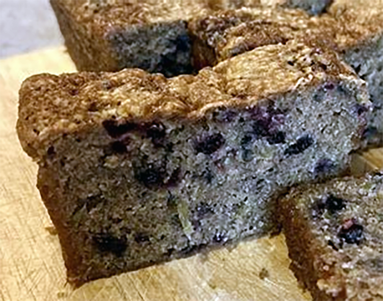 elderberry crunch rye bread on a wooden board