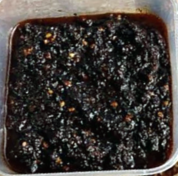 togolese fionfion chilli sauce in a plastic container