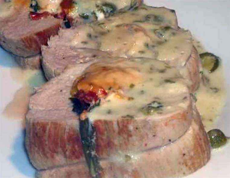 stuffed loin of veal, sliced and served with cream sauce