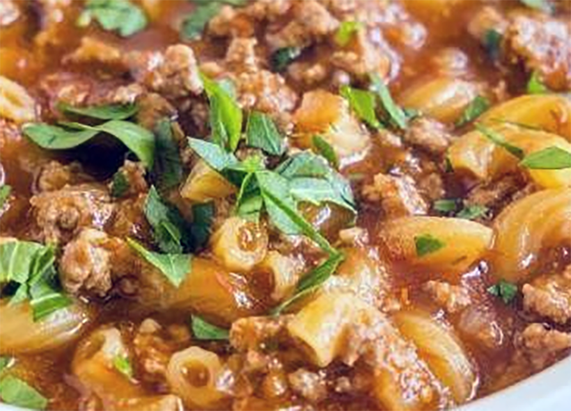 Macaroni and meat ragout in a bowl