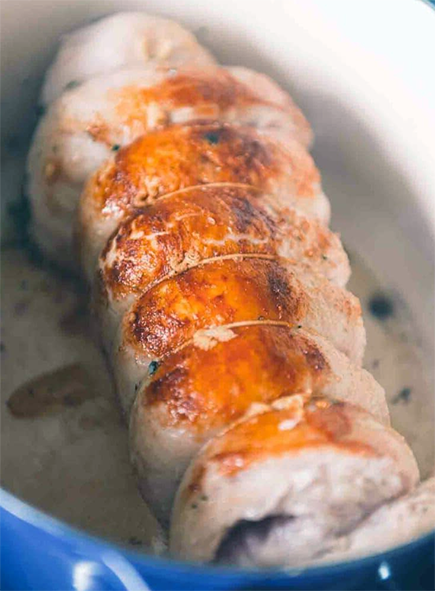 stuffed, rolled, breast of veal in a roasting tin