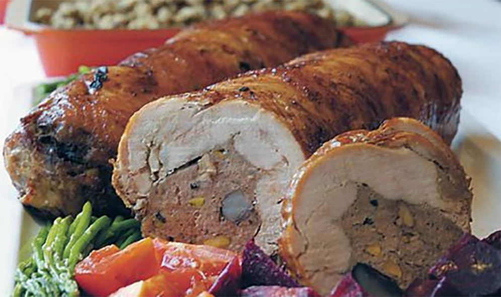 roast galantine of turkey presented at table