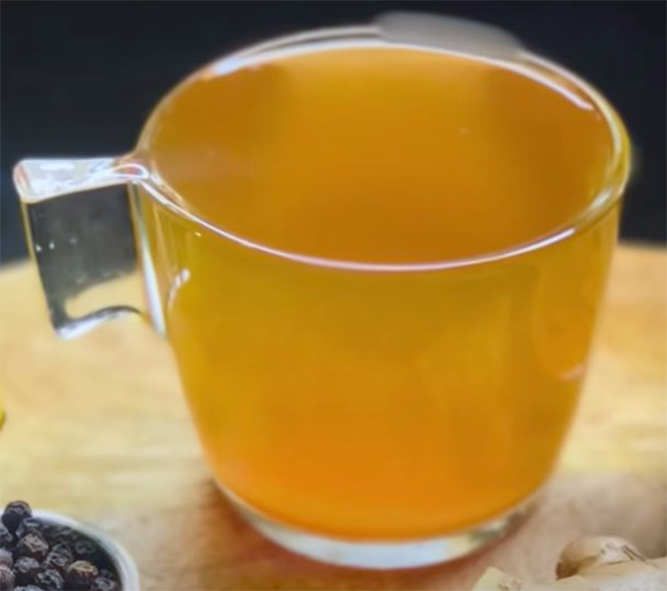 ginger cinnamon tea in a glass cup