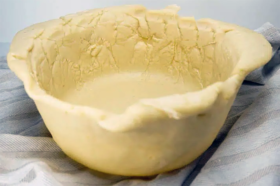 rich hot water crust with egg shaped for a raised pie
