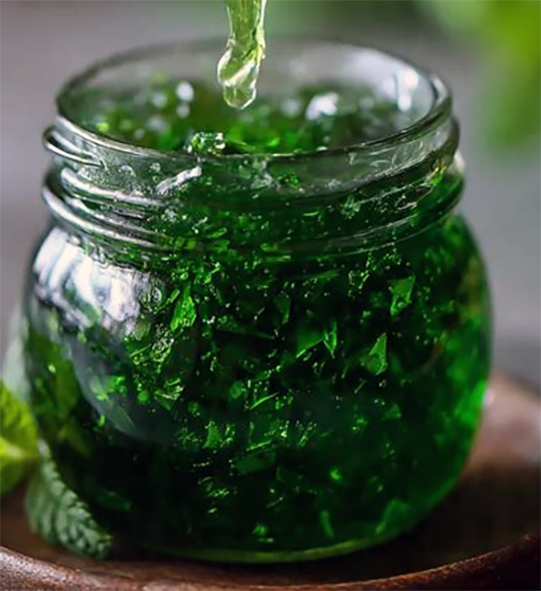 home-made green mint jelly in a jar