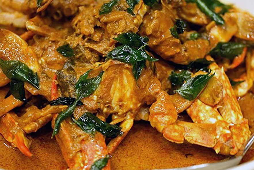 Mozambican crab stew served in a bowl