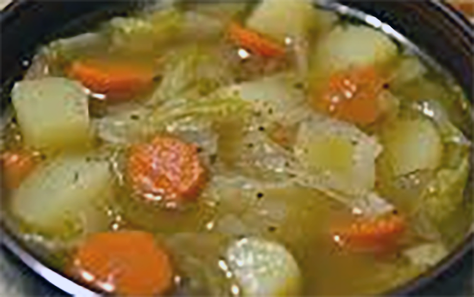 Houses of parliament mixed vegetable and cabbage soup in a bowl