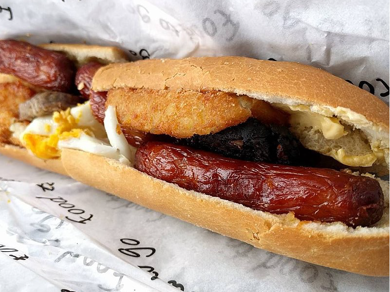 Irish breakfast roll of a baguette filled with all the typical ingredients for an Irish breakfast