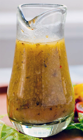 Italian dressing in a glass jug