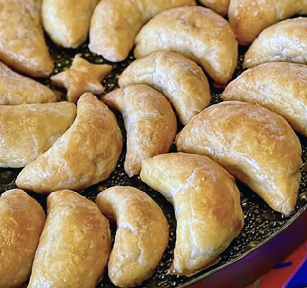 kaldi, Algerian crescent pastries served on a tray