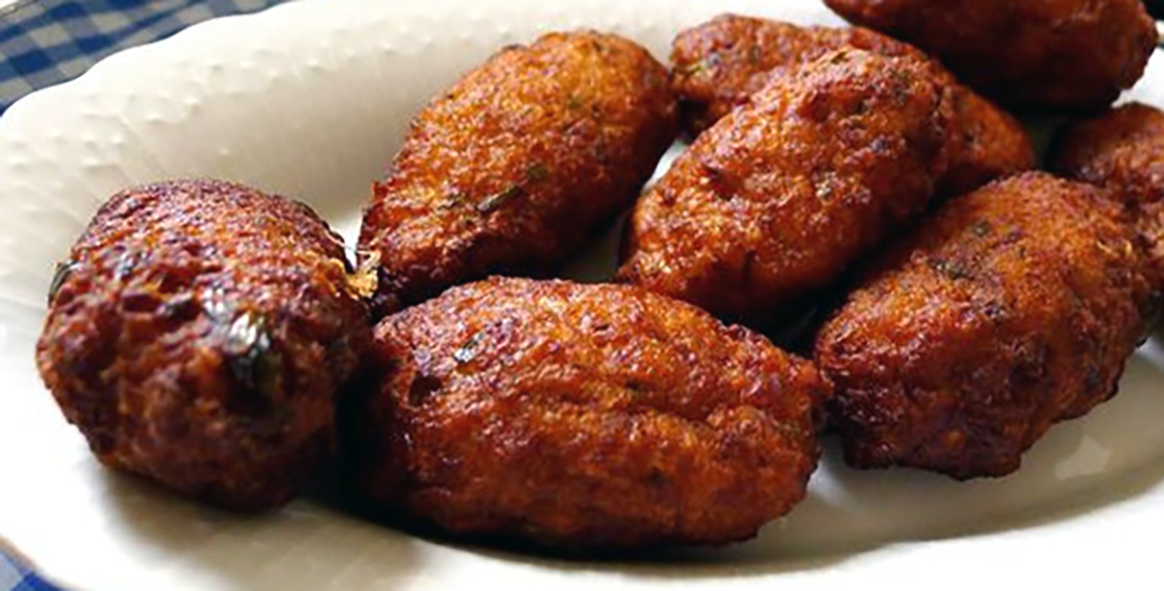 traditional Cypriot beef keftedhes on a white plate