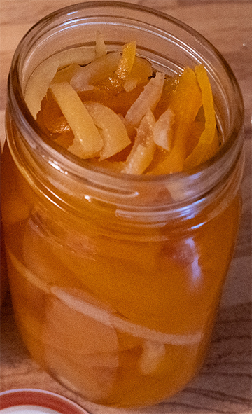 pumpkin slivers preserved in syrup in a glass jar