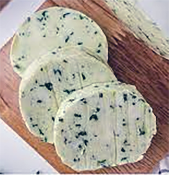 slices of maitre d'hotel butter on a chopping board