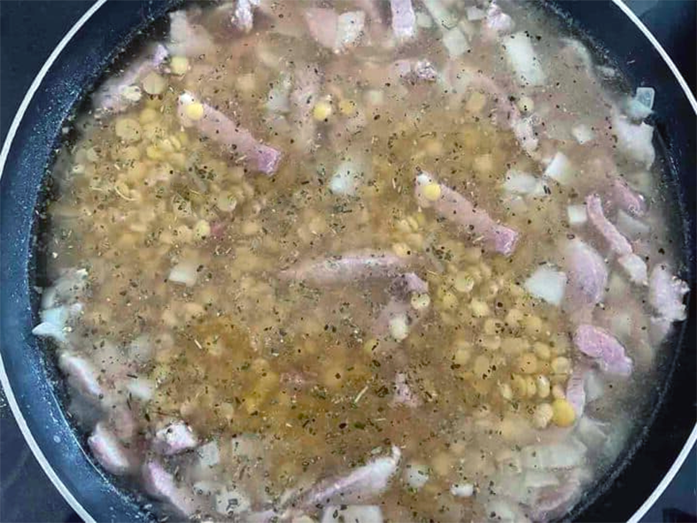 split pea and bacon pottage in a stock pot