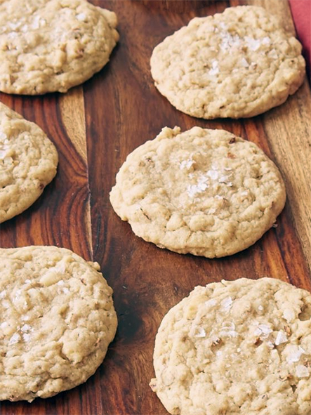 mixed nut butter cookies on a wooden board