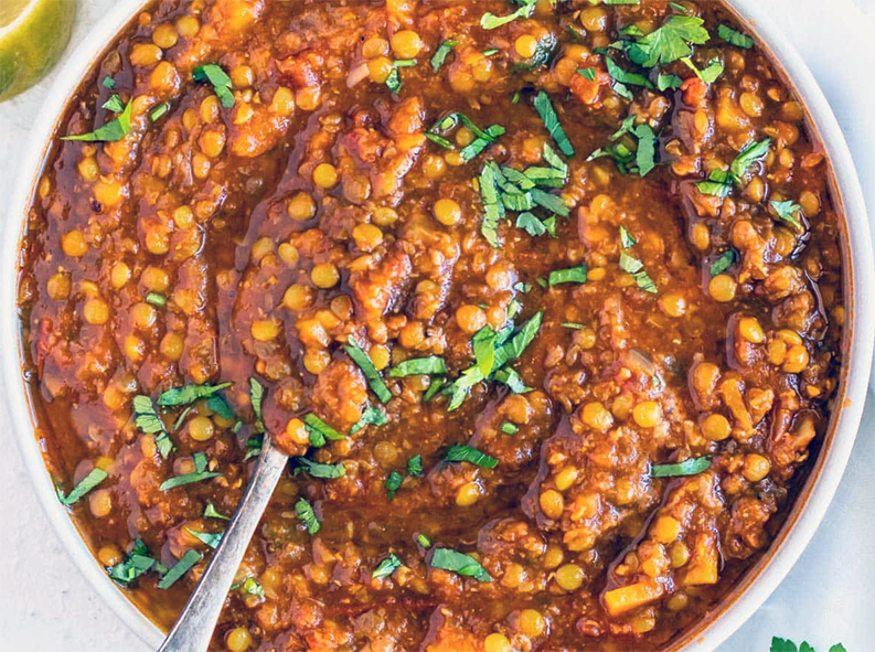 Moroccan lentil soup served in a soup bowl