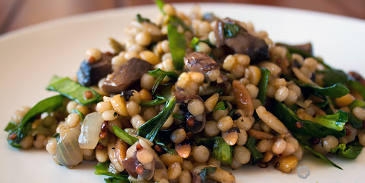 pilaf made with five hrains served piled on a plate