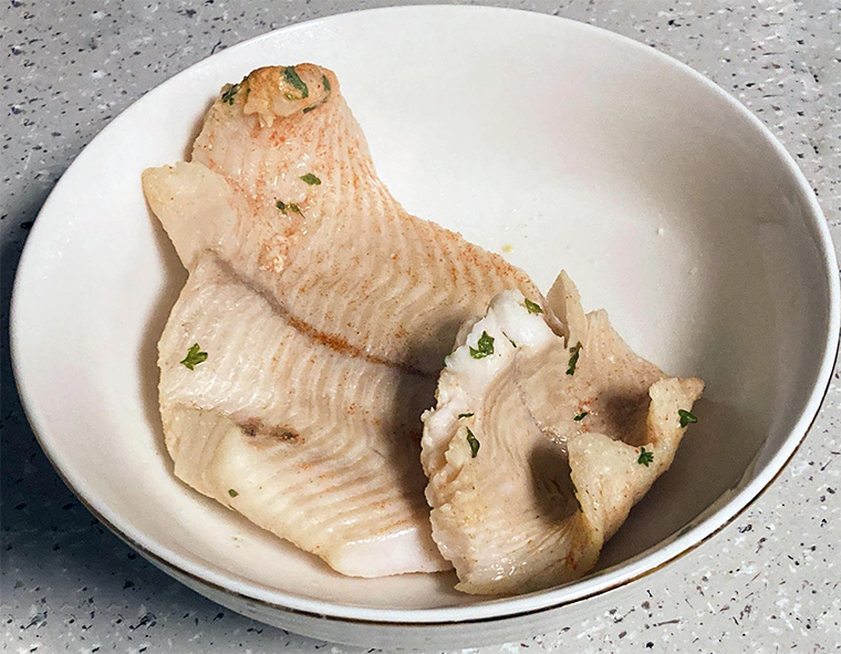 boiled flounder pieces in a bowl