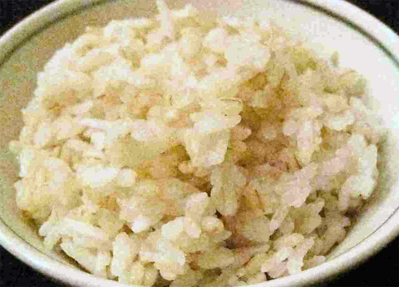 mugimeshi, rice with pressed barley in a serving bowl
