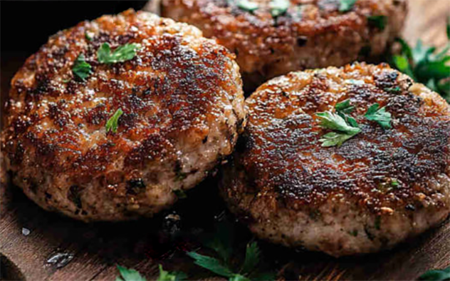 fried mushroom cutlets on a chopping board