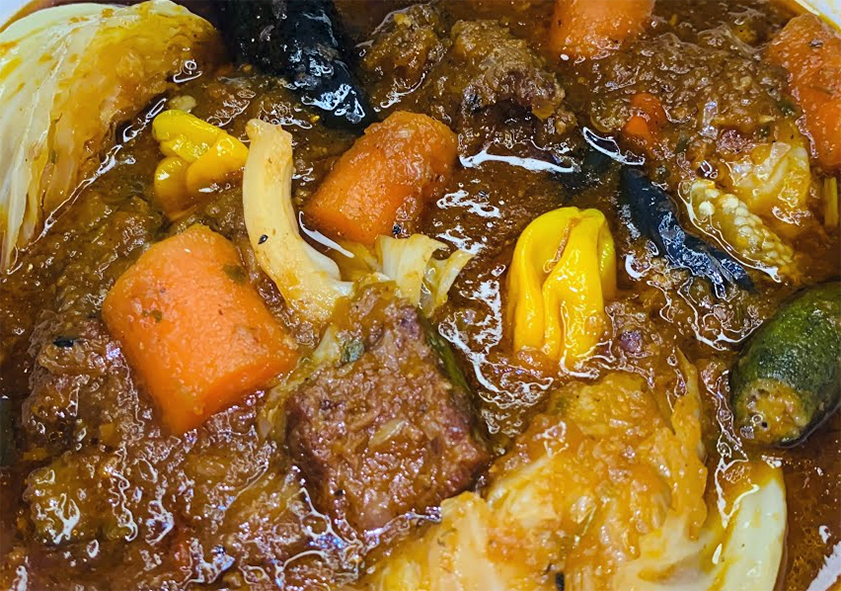 Ivorian nandji stew of meat and mixed vegetables with chilli served in a bowl