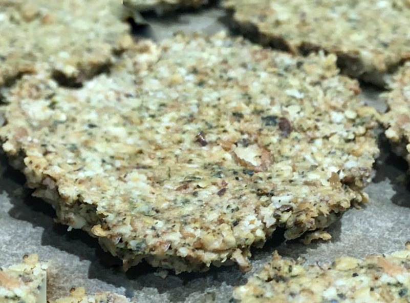 nettle puree oatcakes on a baking tray