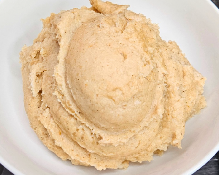scoop of oats swallow or oat fufu on a plate