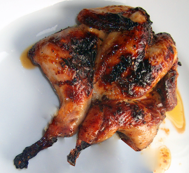 grilled quail on a plate