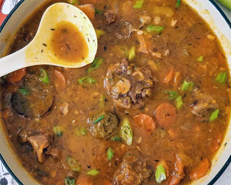 oxtail soup in a cast iron casserole