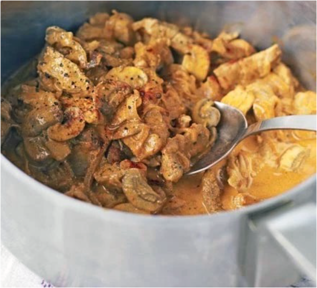 paprika pork cooking in a saucepan