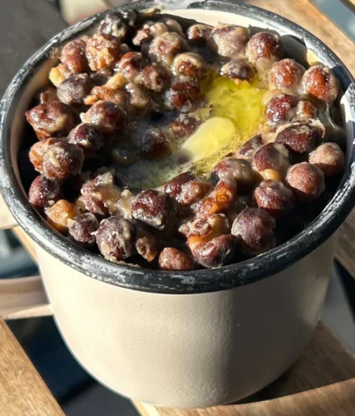 dried carlin peas served in a cup with vinegar