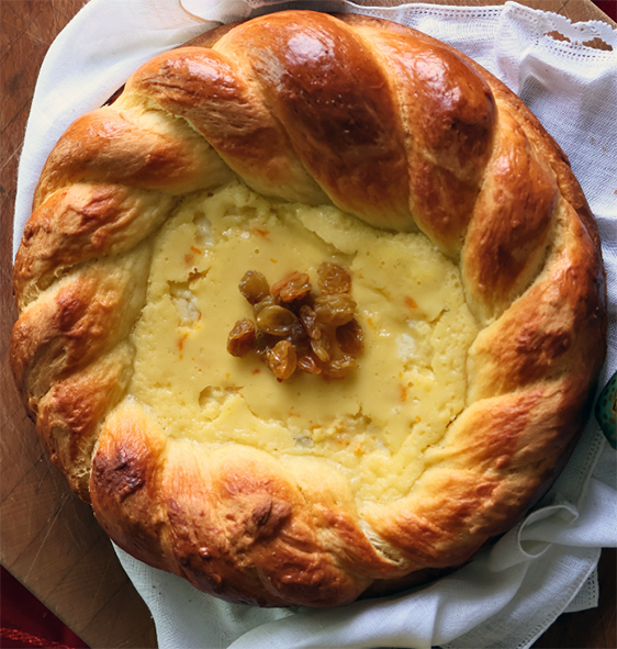 Romanian pasca, easter bread cheesecake on a cloth