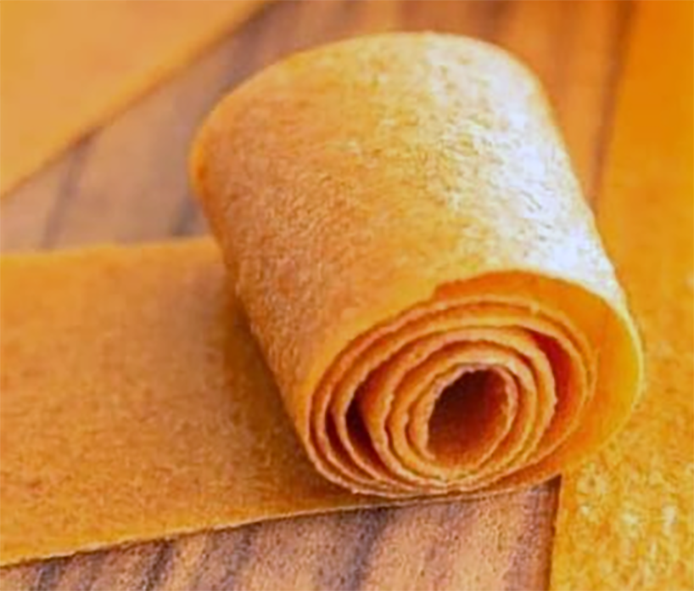 rolled-up sheet of apricot leather