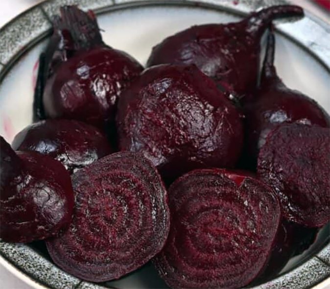 peeled baked beetroot in a bowl