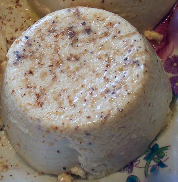 set bath pudding turned out onto a plate