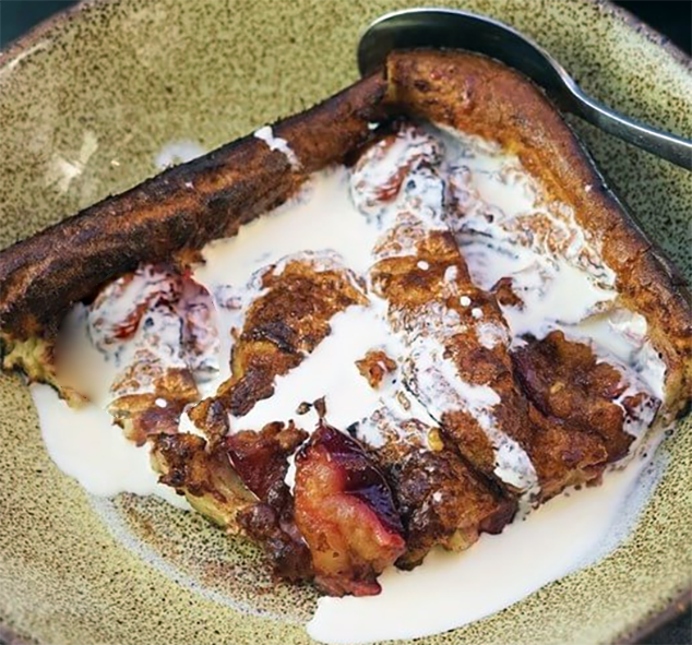 baked batter pudding served with cream