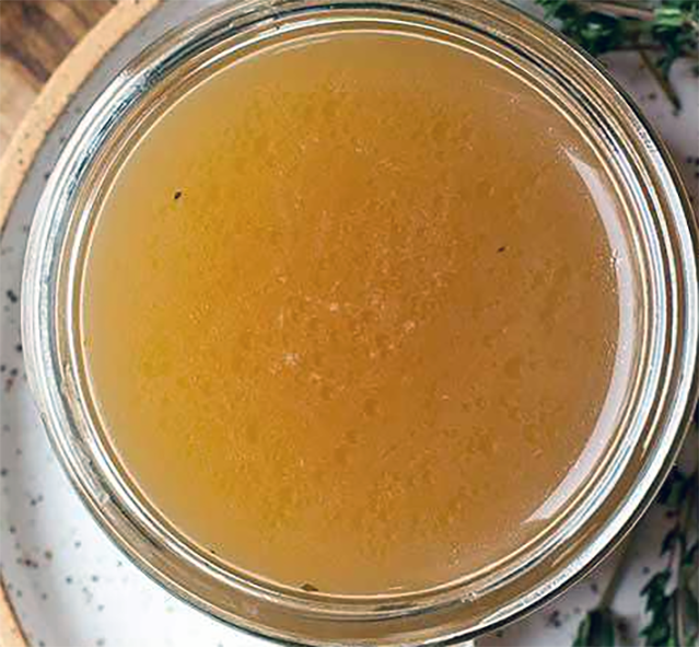 beef broth in a glass jar