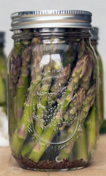 pickled asparagus in a jar