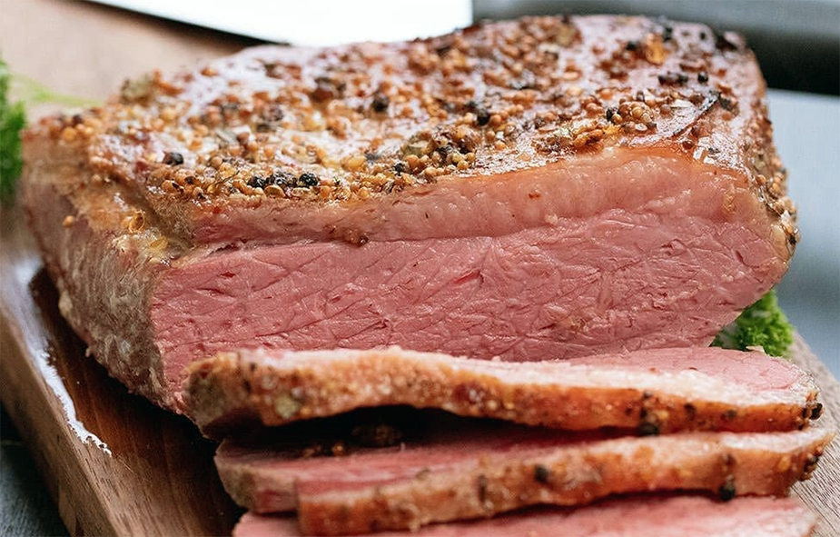 salt beef on a chopping board