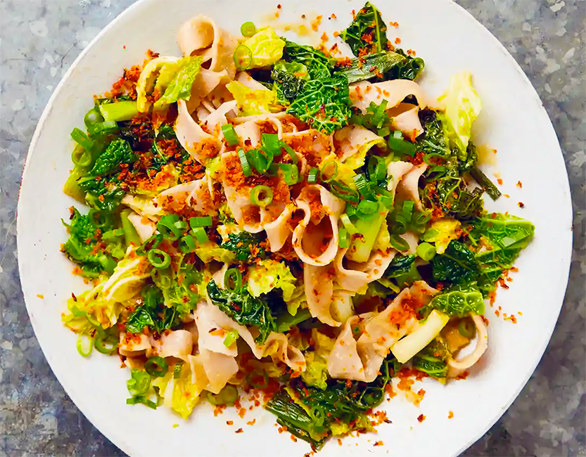 pizzoccheri pasta served with miso cabbage, spring onions and breadcrumbs
