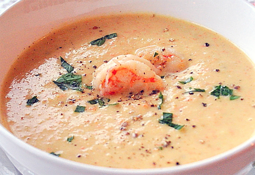 prawn puree soup thickened with breadcrumbs garnished with king prawns