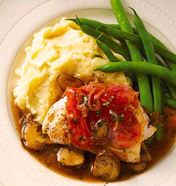 prosciutto wrapped chicken thighs served with mushroom marsala sauce, mashed potatoes and green beans