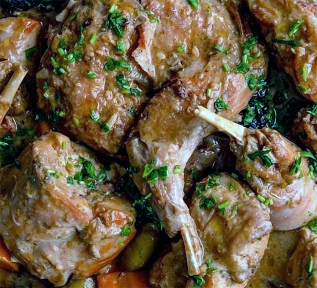 rabbit stew with mallow cheeses served on a plate