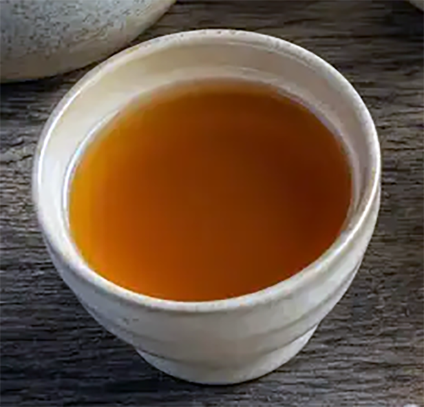Malagasy burned rice drink in a handle-less cup
