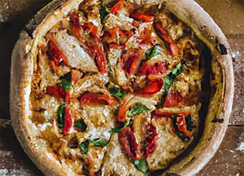 roast bell pepper and gorgonzola pizza on a boboli crust with a rolled rim